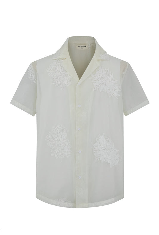 Short-sleeved shirt with embroidered floral patterns